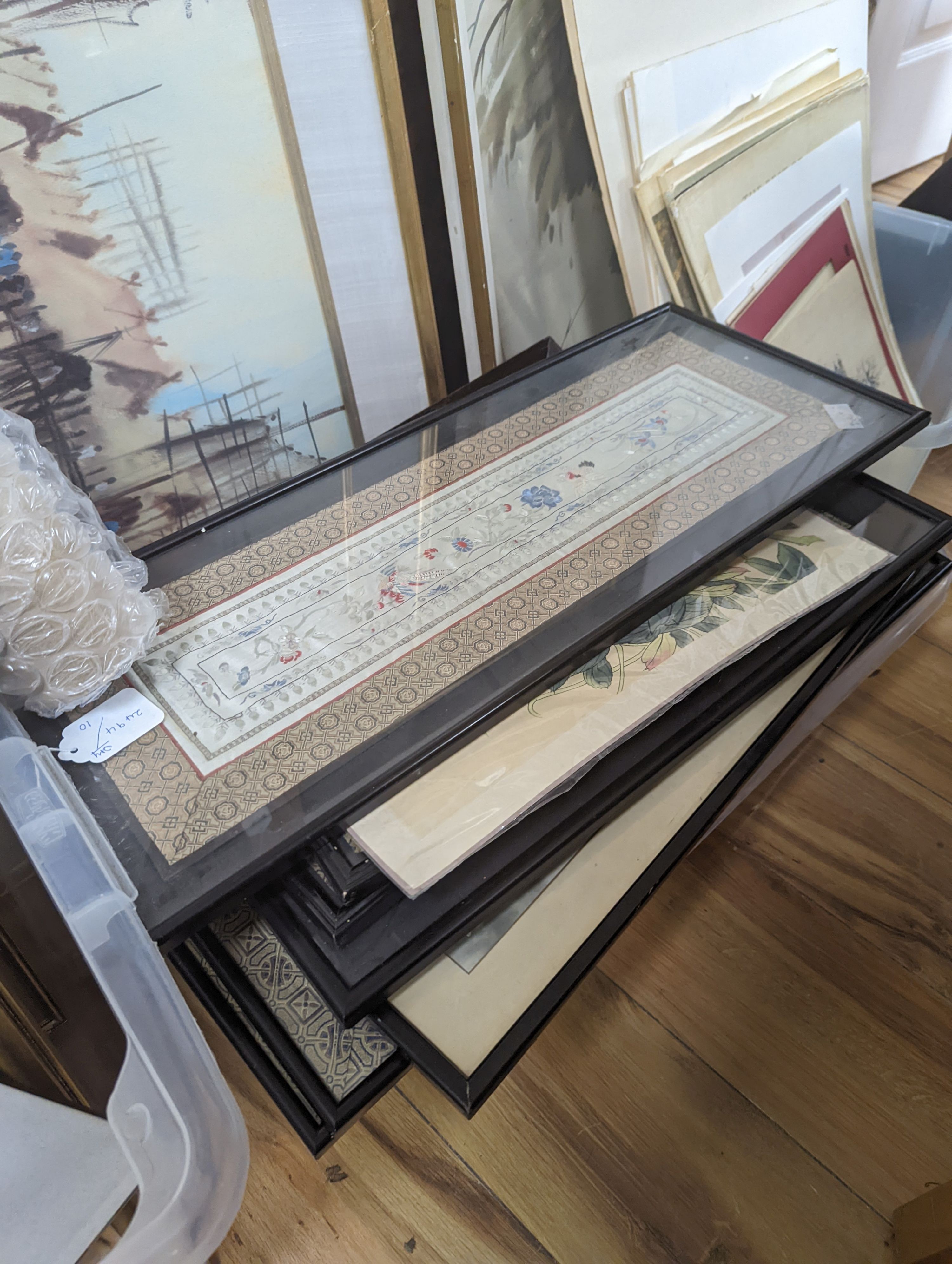 A large collection of assorted 20th century Asian pictures and textile panels